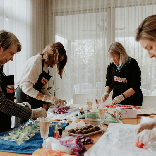 A group of crafters working with Artpack silk dye kit